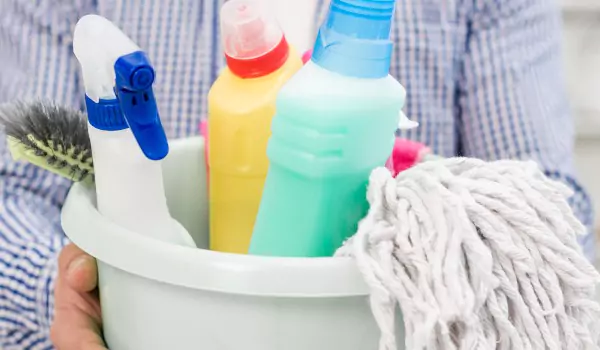 some cleaning supplies in a cleaning caddy